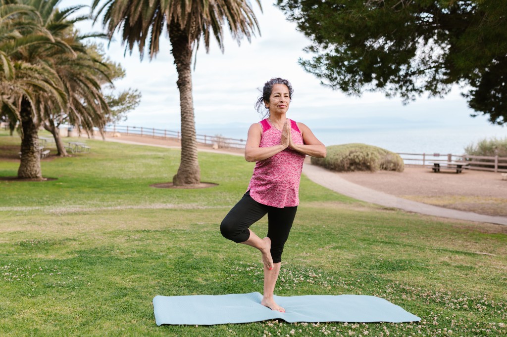 Woman doing strength training as part of Body in Motion pillar content