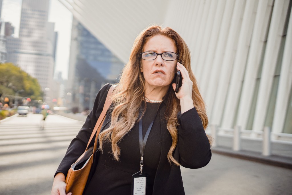 Woman pausing to breathe as part of Mind & Emotional Wellbeing pillar content